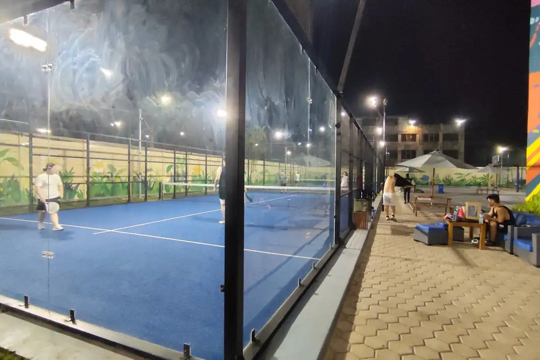 Padel court under the lights at night